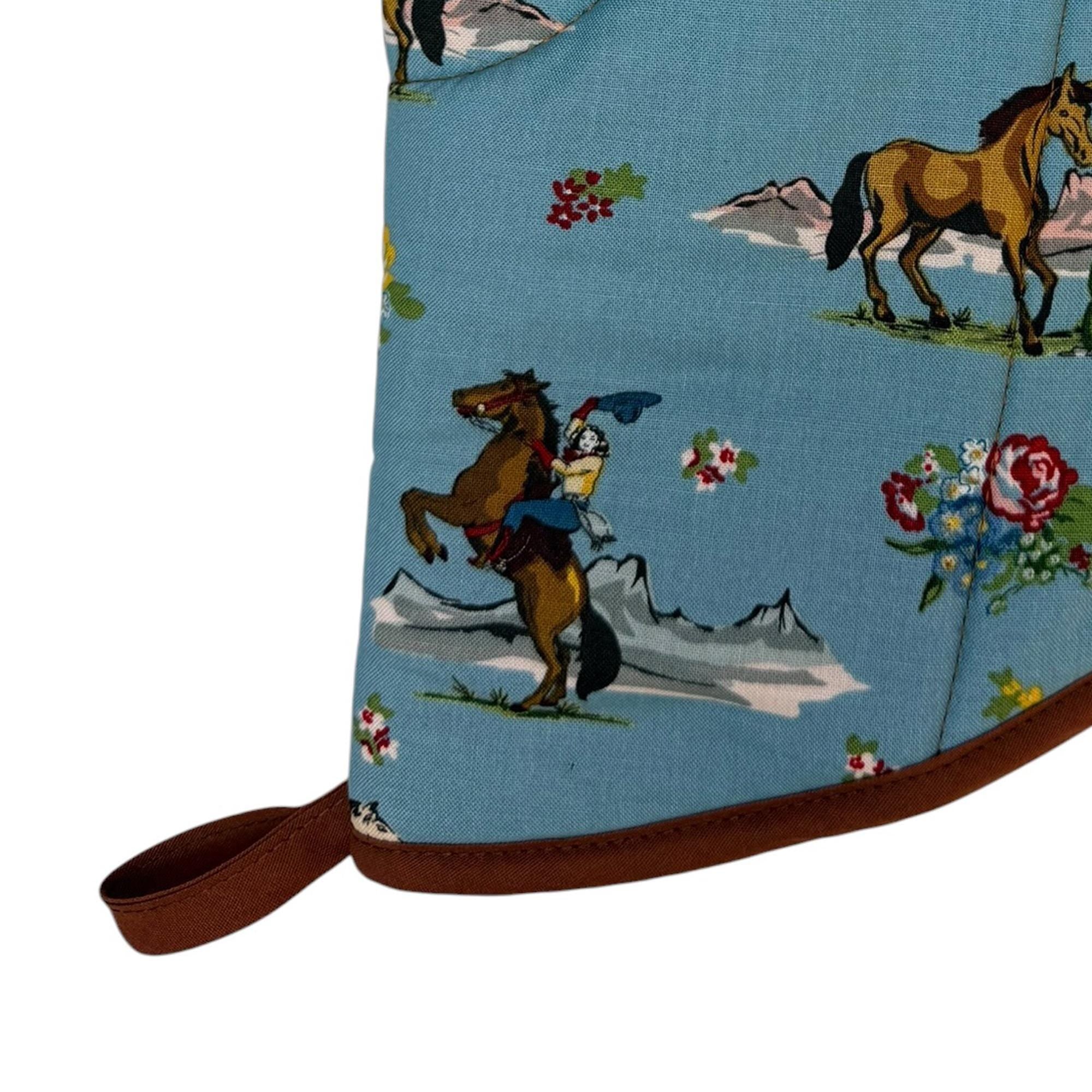 Cowgirl Rides On Oven Mitt